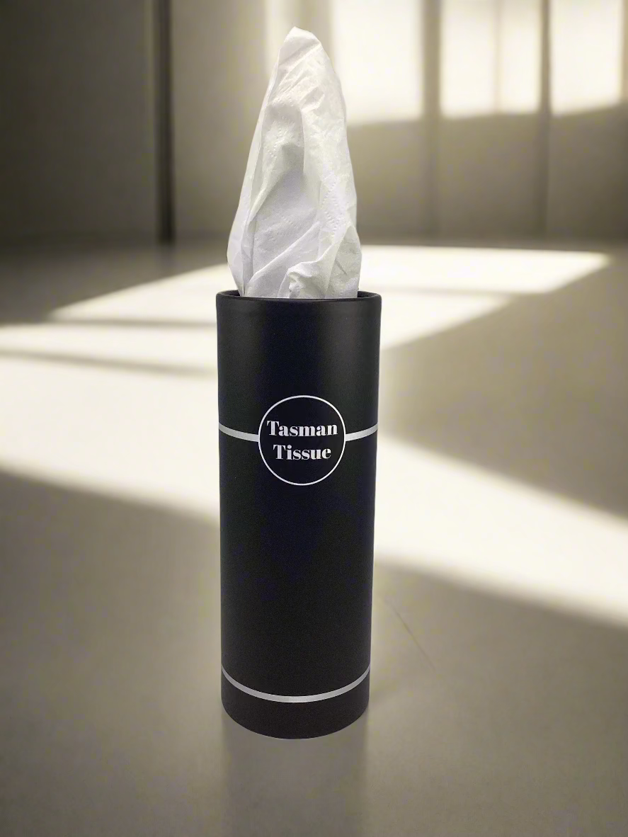 Paper tissue in black silver cylindrical container for desk and car